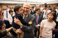 Church President Russell M. Nelson greets various people at a devotional held in Singapore on November 20, 2019.
