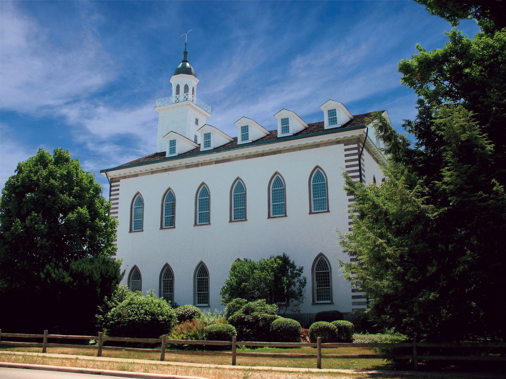 A side view of the exterior of the Kirtland Temple.