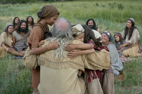 Lehi hugs his grandchildren.