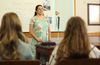 Woman teaching class