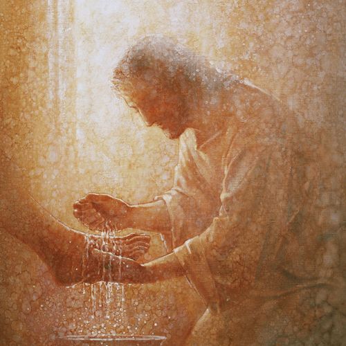 Jesus Christ washing someone’s feet