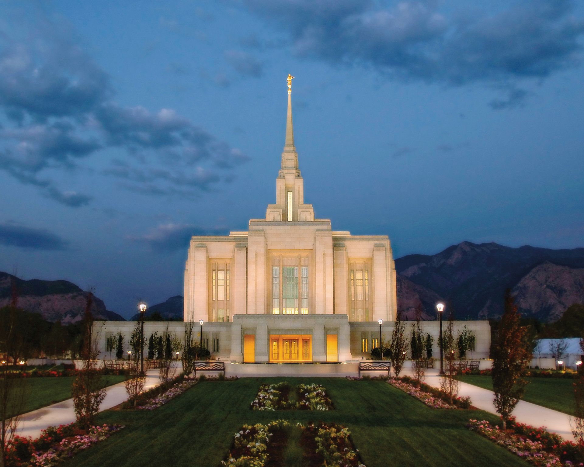 The Ogden Utah Temple lit up in the evening.
