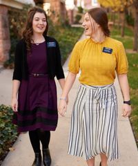 Sister missionaries model appropriate dress and attire. They are wearing approved clothing and shoes.