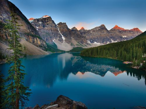 A view of Moraine Lake in Canada at sunrise.