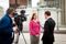 Woman being interviewed for television.