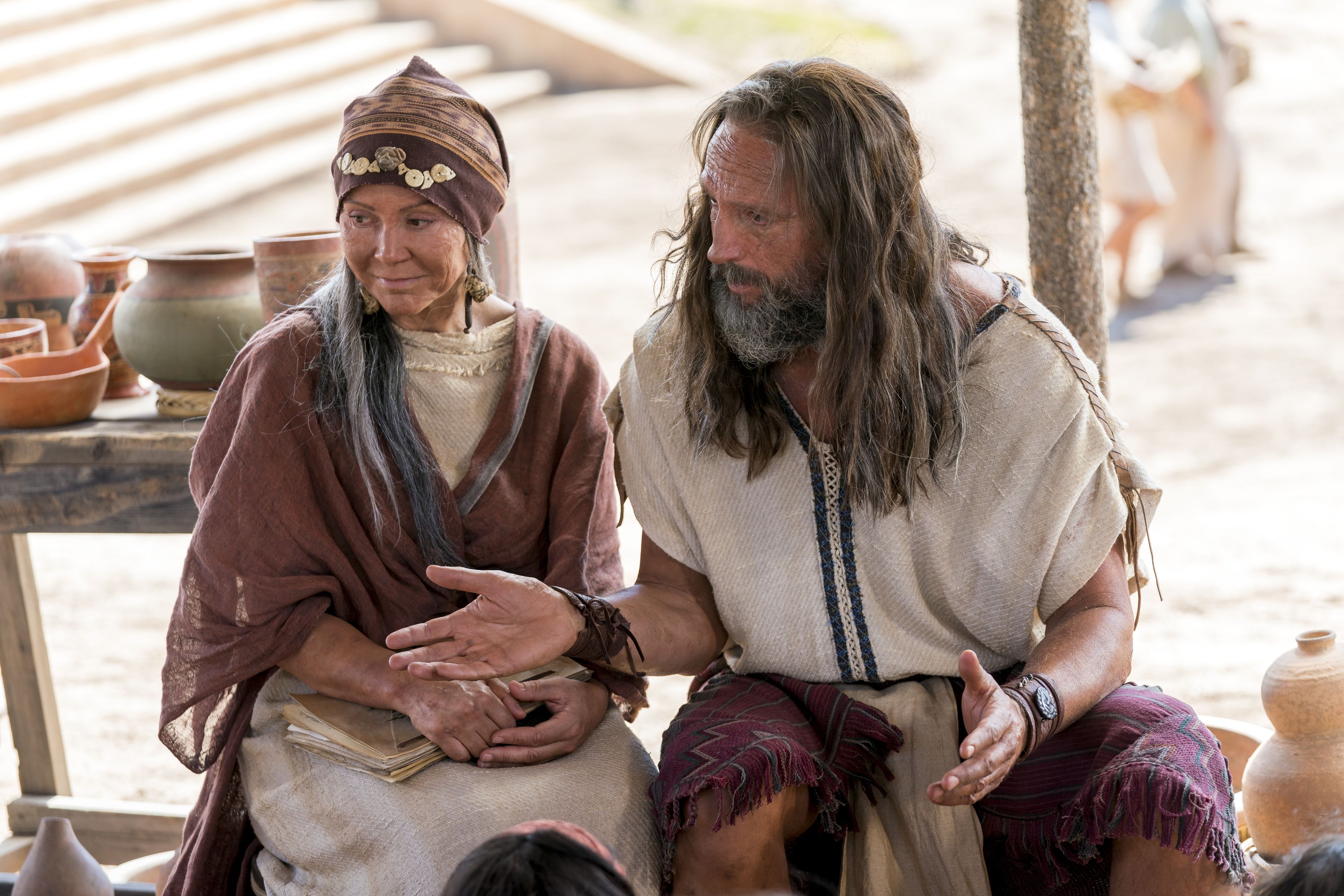 Nephi and his wife teach the people about baptism and the doctrine of Christ.