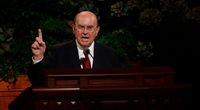 Elder Quentin L. Cook speaks during a session of conference.