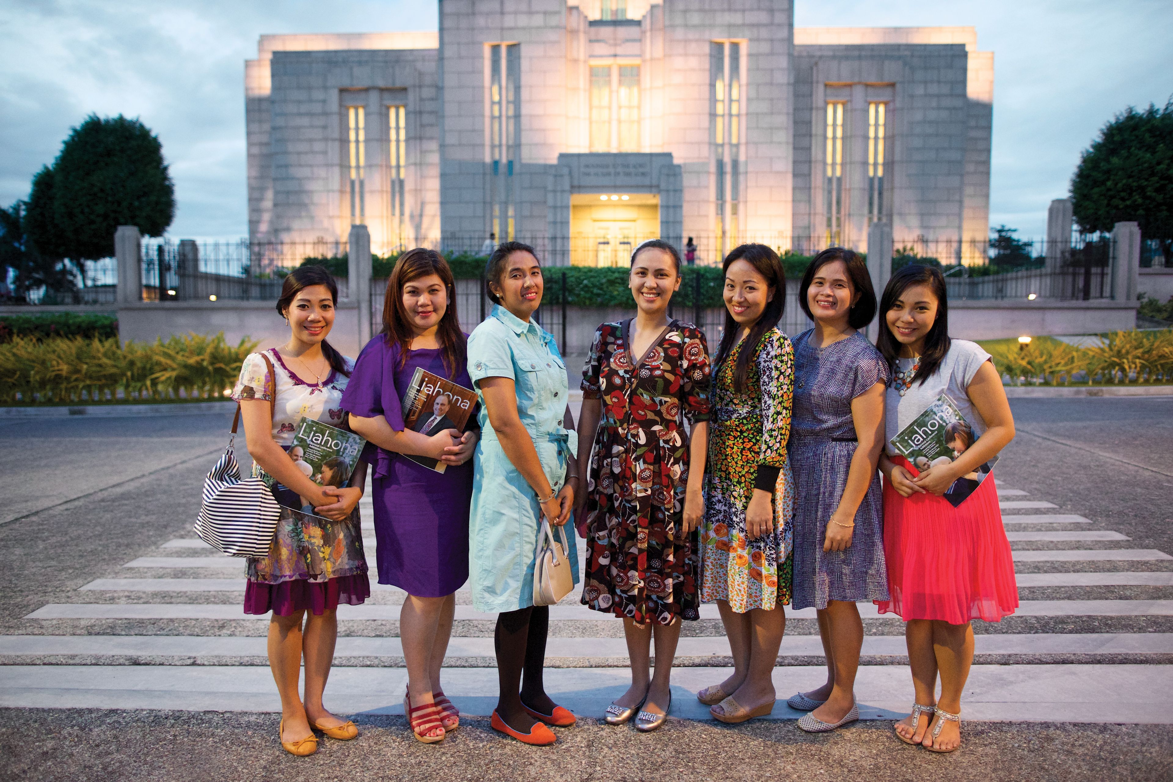 Filipino women standing in front of the Cebu City Philippines Temple.