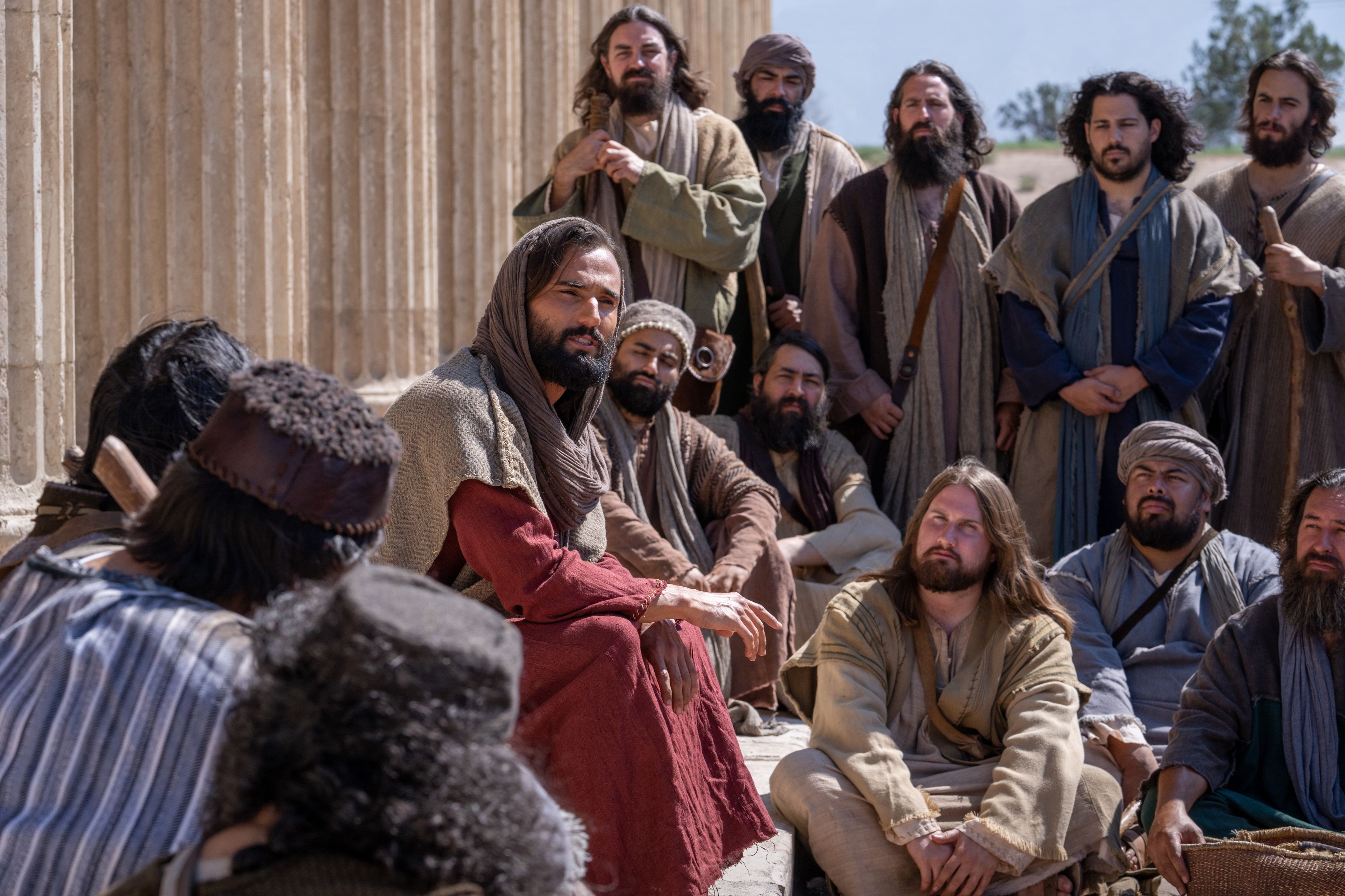 Jesus Christ teaches a small group near Jerusalem. With Him are Thomas, Simon, Peter, Philip, Andrew, John, James, Matthew, Bartholomew, Thaddeus, James son of Alpheus, and Judas.
