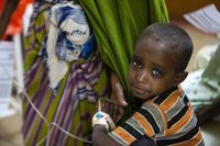 Young boy patient, crying with fear, at the Cataract Outreach Camp in Harar, Ethiopia, Himalayan Cataract Project. (horiz)