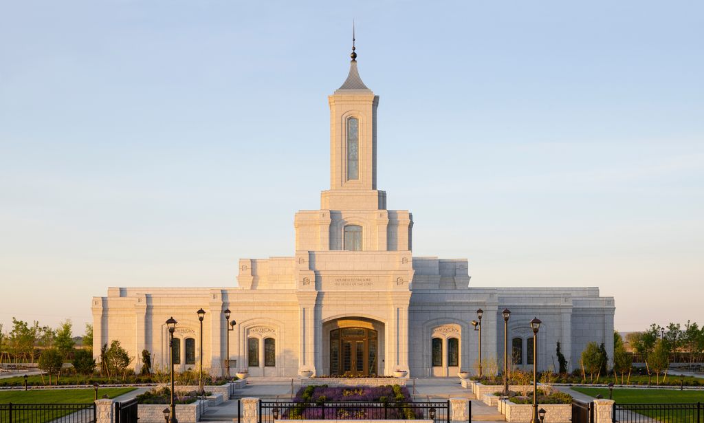 Exterior images of the Moses Lake Washington Temple. The images appear to be taken in the early morning. It highlights the front side of the Temple.