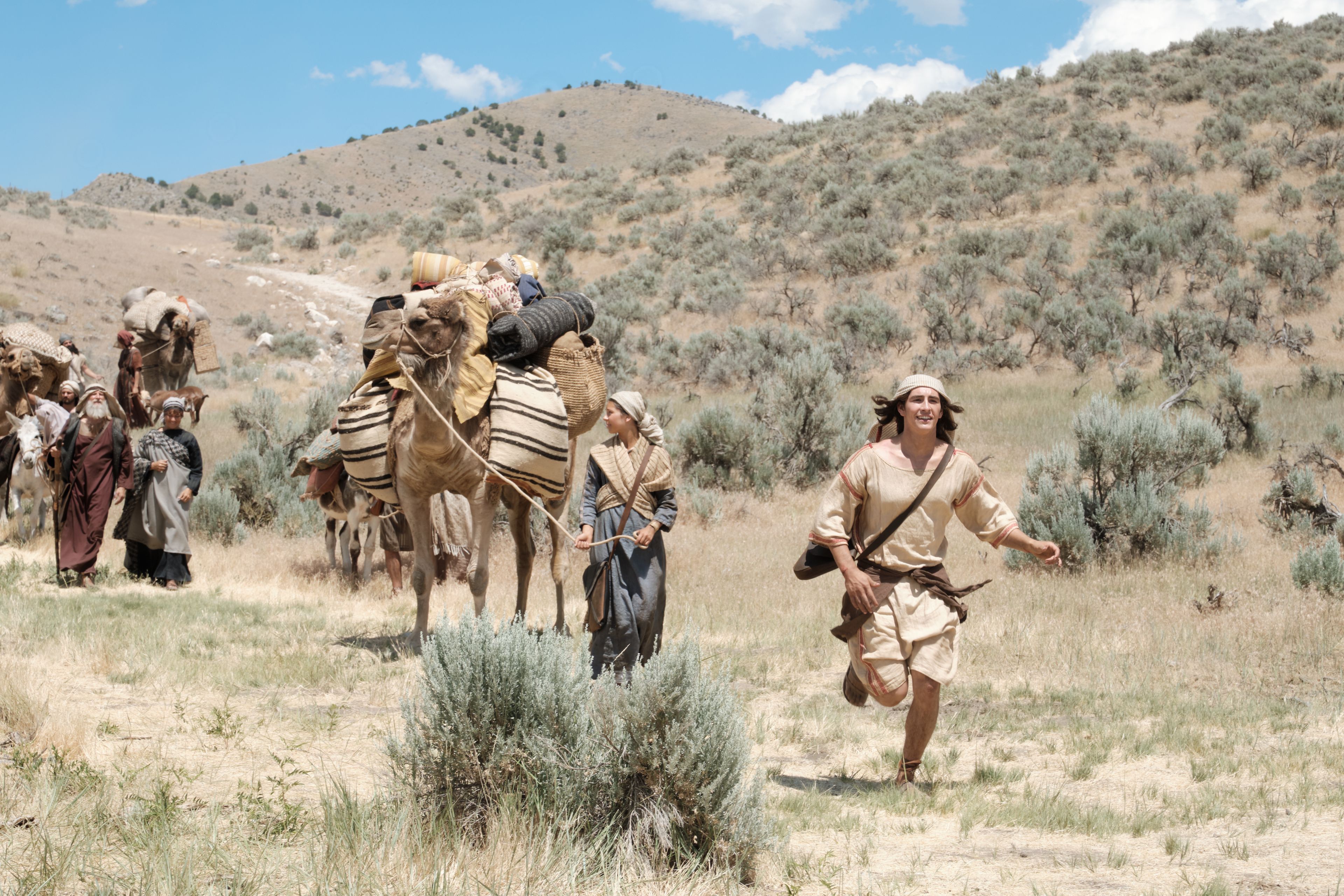 Nephi runs to greet his parents upon his return from Jerusalem with Ishmael's family.