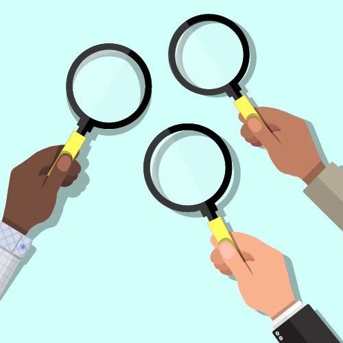 three hands holding magnifying glasses