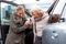 Woman Helps Elderly Mother