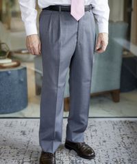 A senior missionary models appropriatesuits pants and shoes.
