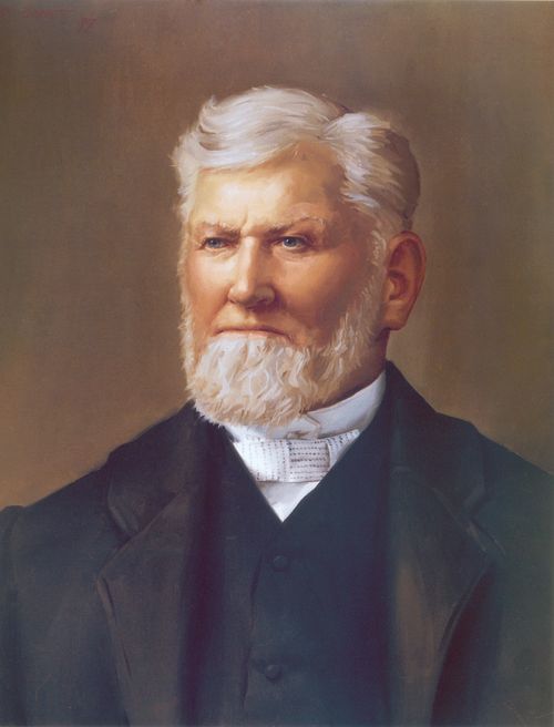 A portrait by Kenneth A. Corbett of President Wilford Woodruff wearing a white shirt, black vest, and black suit coat.