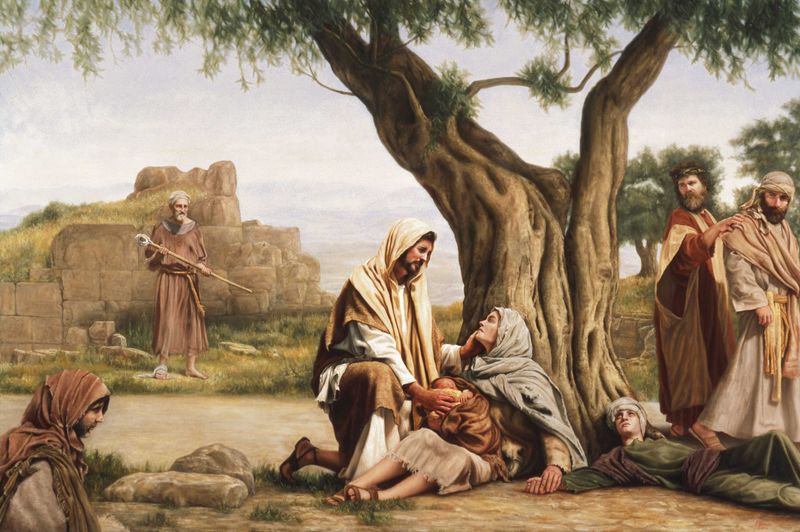 Christ reaching out to a woman and her baby, who are sitting at the base of a tree while others look on in curiosity.