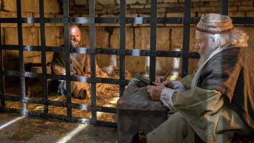 Pablo dictando una epístola en prisión