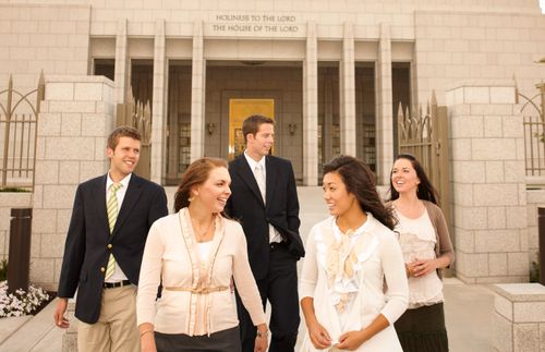 young men and women outside Draper Utah Temple