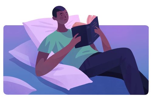 en man som läser en bok