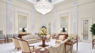 Belem Brazil Temple interiors. An interior image of the temple featuring the Celestial Room. There are chairs and a chandelier hanging.