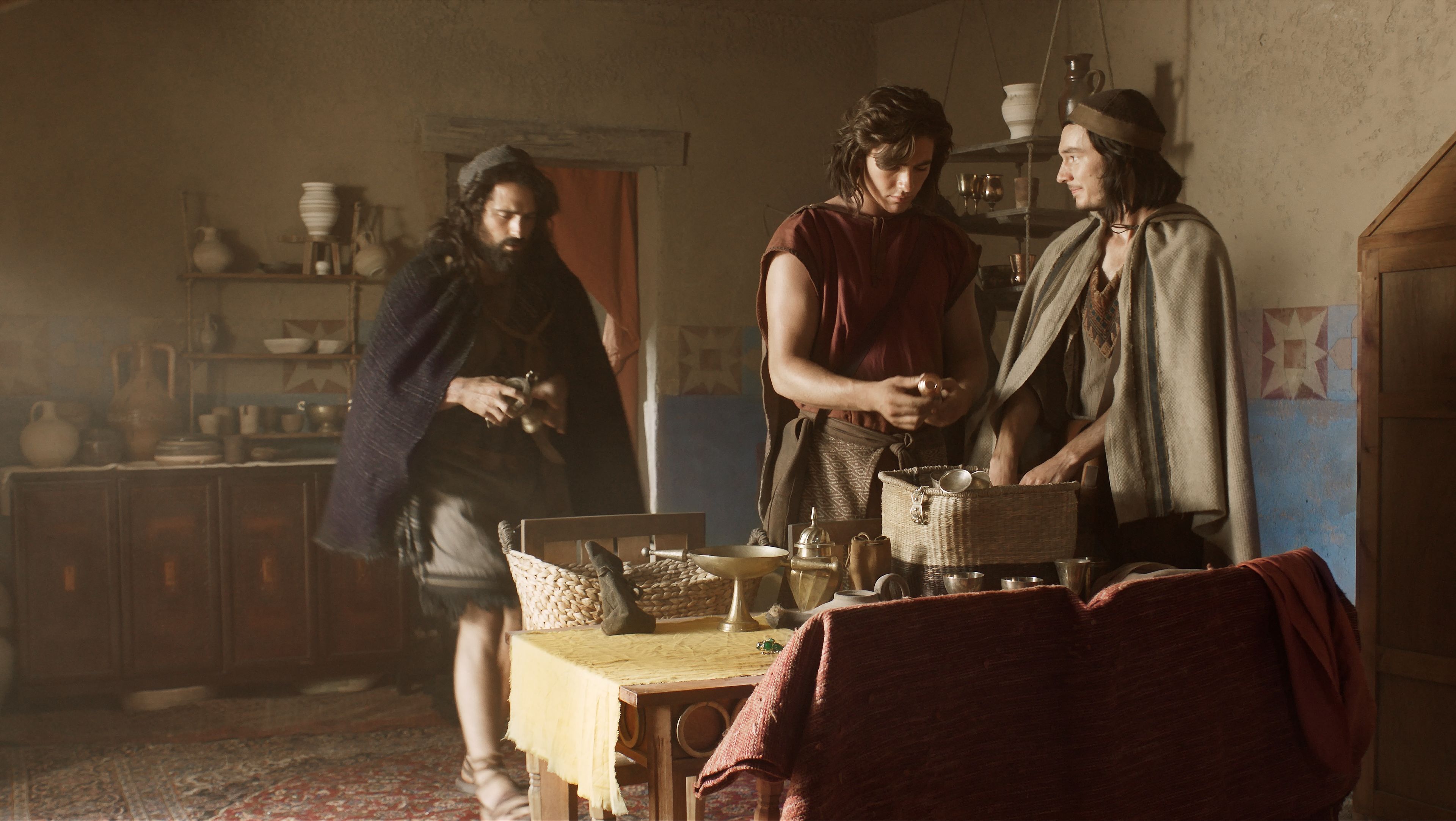 Nephi and his brothers gather their possessions to trade for the brass plates.