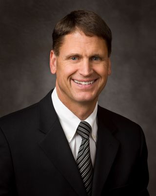 Élder Carl B. Cook