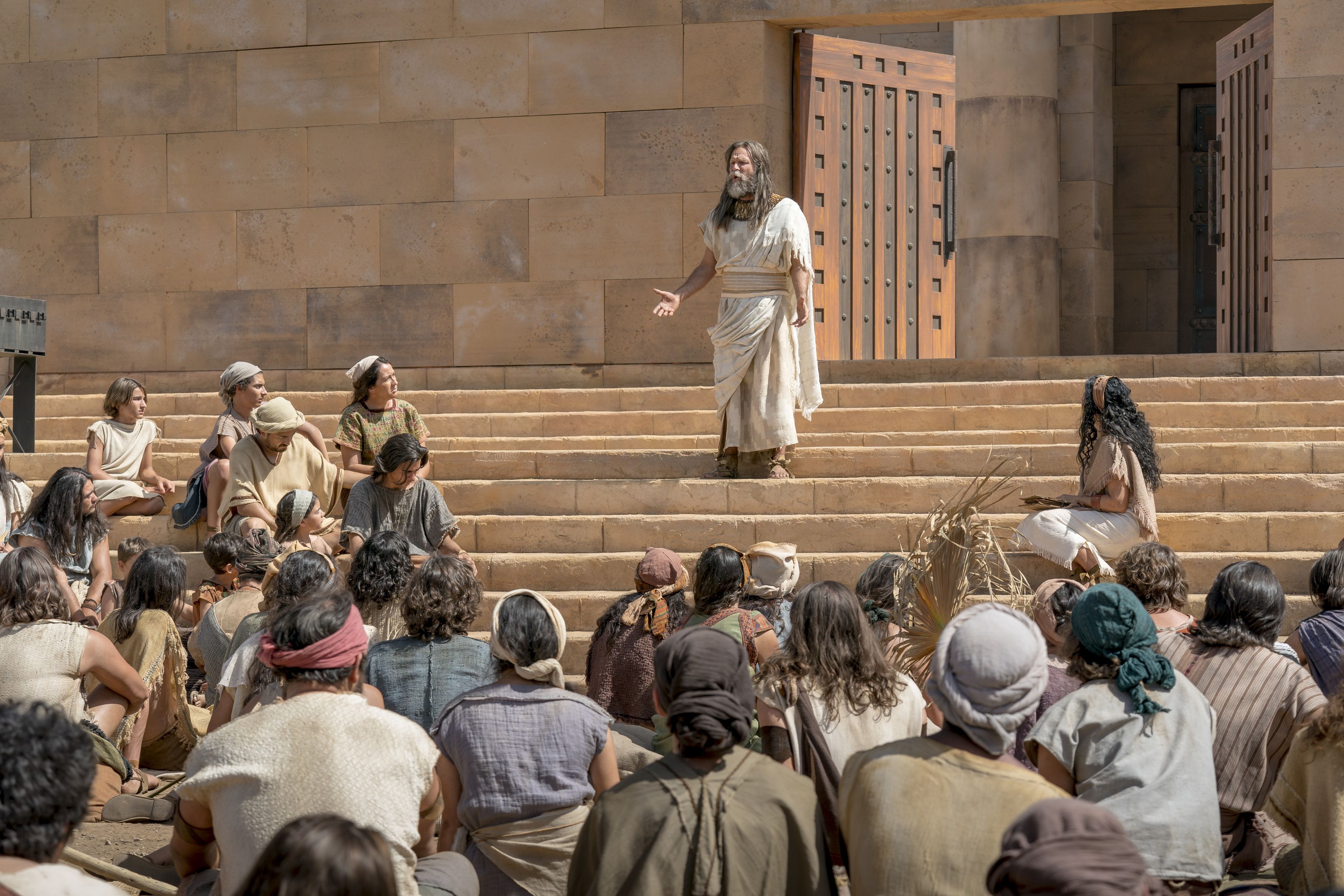 Jacob stands on the steps of the temple as he teaches the Nephite people about pride and chastity.