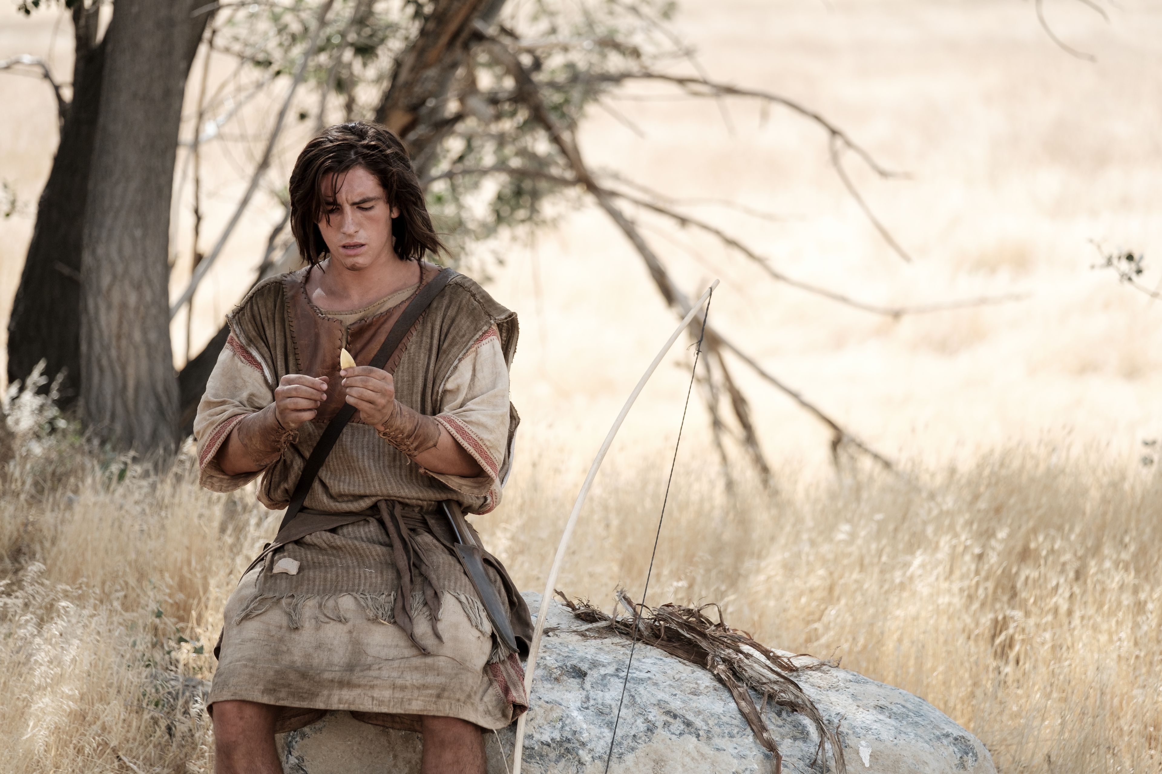 Nephi makes a new bow and an arrow in the wilderness.