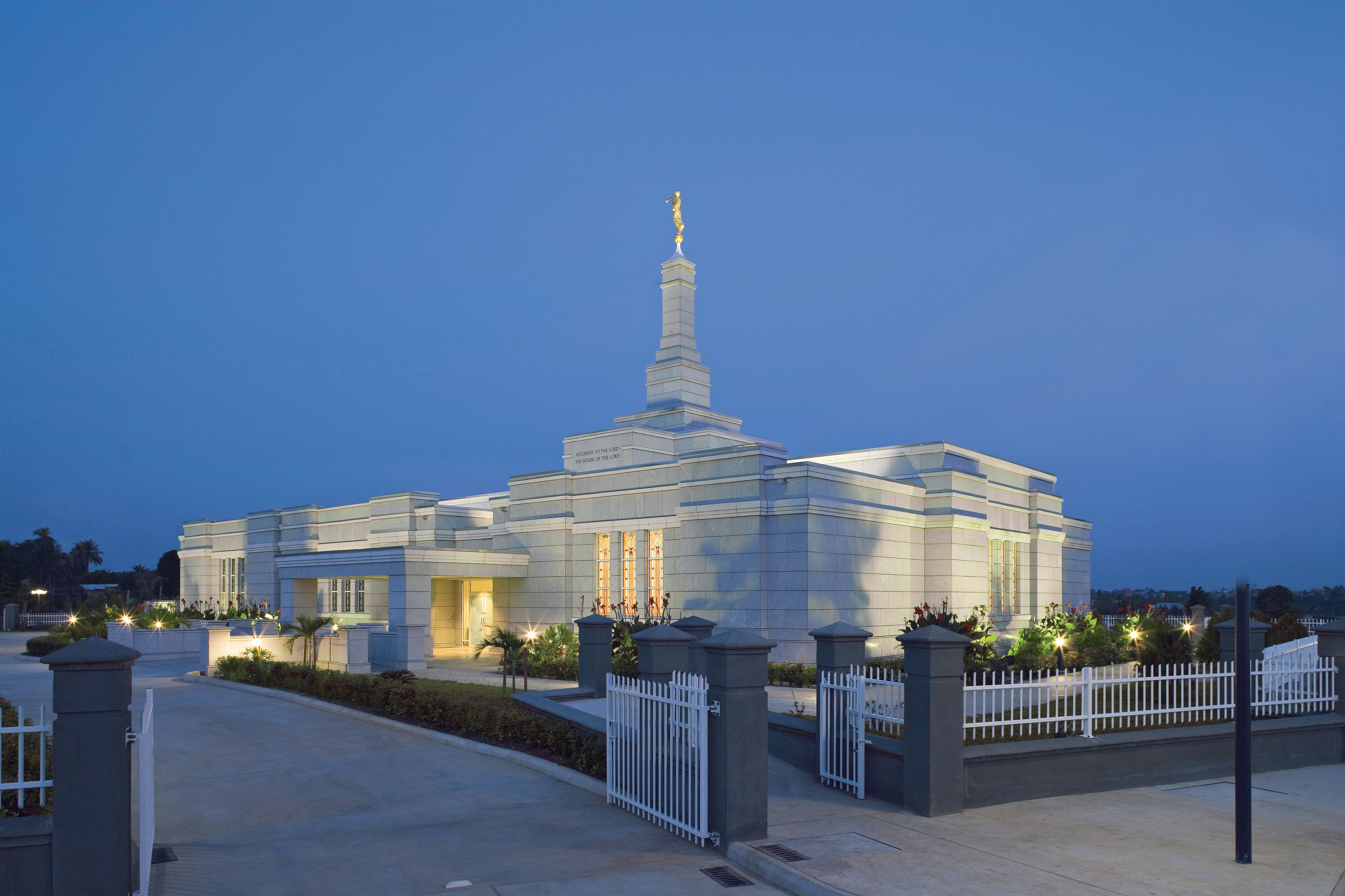 The Aba Nigeria Temple lights up in the evening.