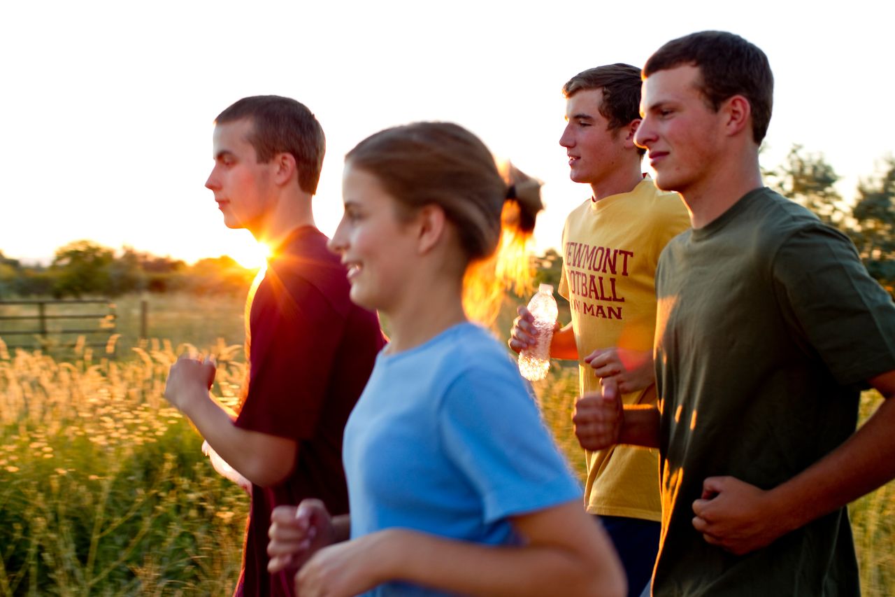 A group of teenagers out for a jog
