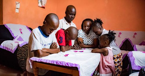 African family praying