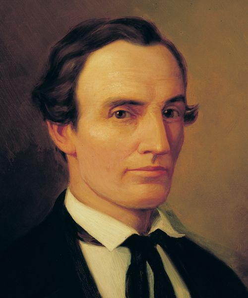 Head and shoulder portrait of Oliver Cowdery in suit and tie.