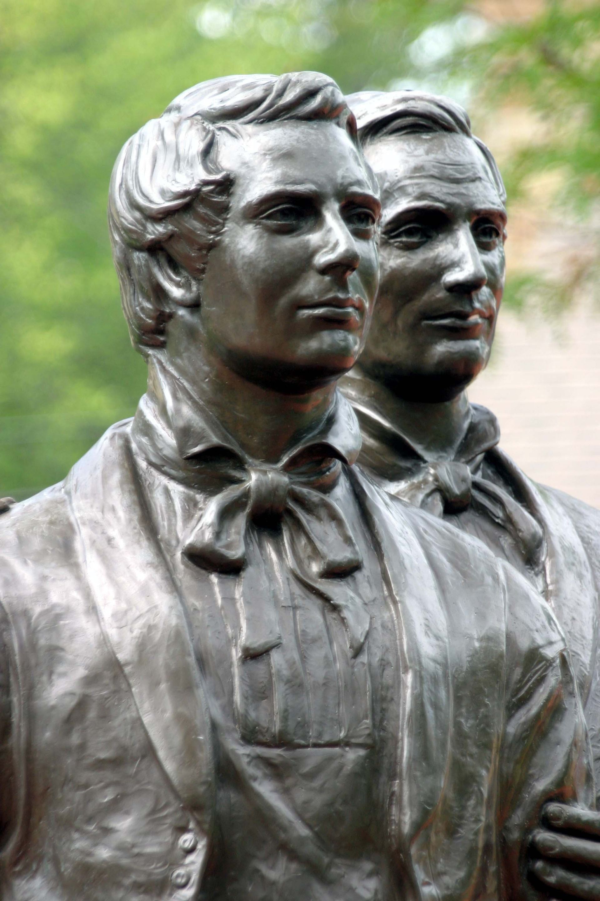 A close-up of the faces of the statue of Joseph and Hyrum Smith by Carthage Jail in Illinois.