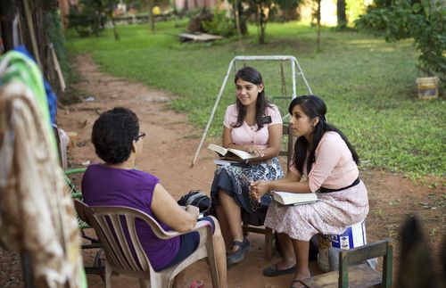 sister missionaries teaching