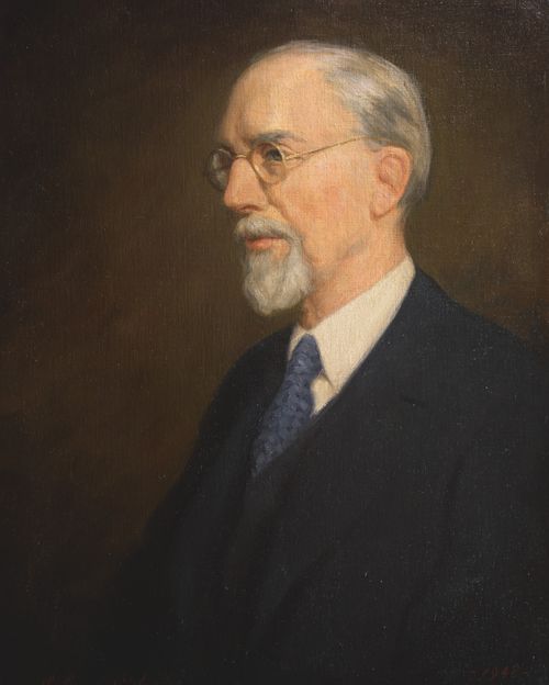 A painted portrait by Lee Greene Richards of George Albert Smith in a dark suit and a blue tie.