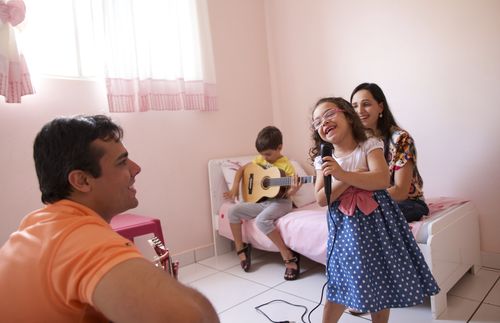 family playing music together