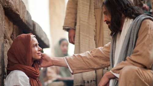 Jesus Christ healing a woman
