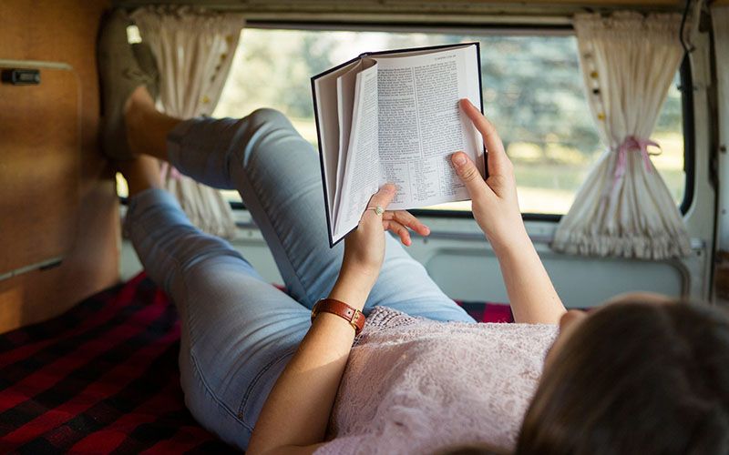 Girl reading Book of Mormon