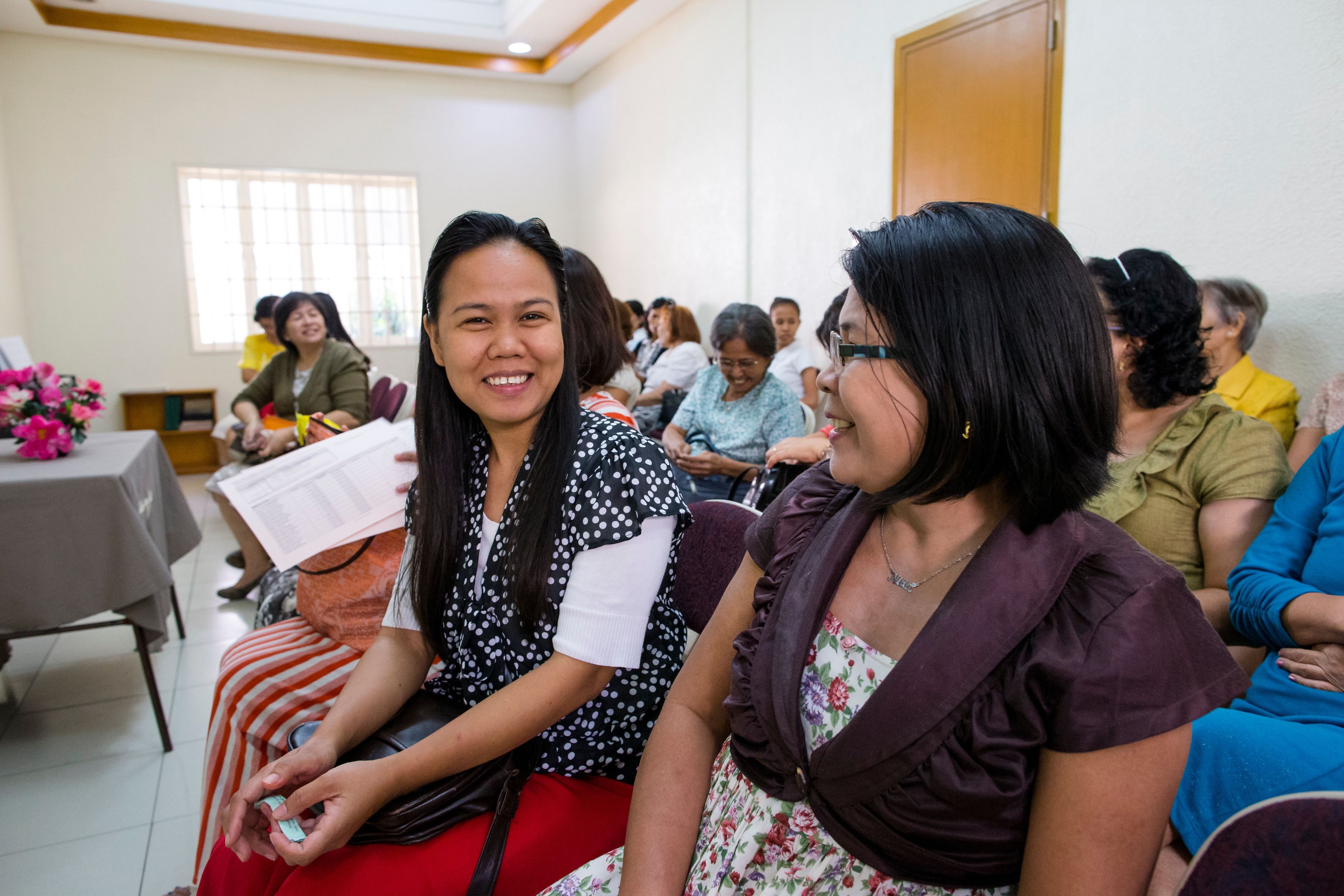 Women in the Philippines meeting together in Relief Society.