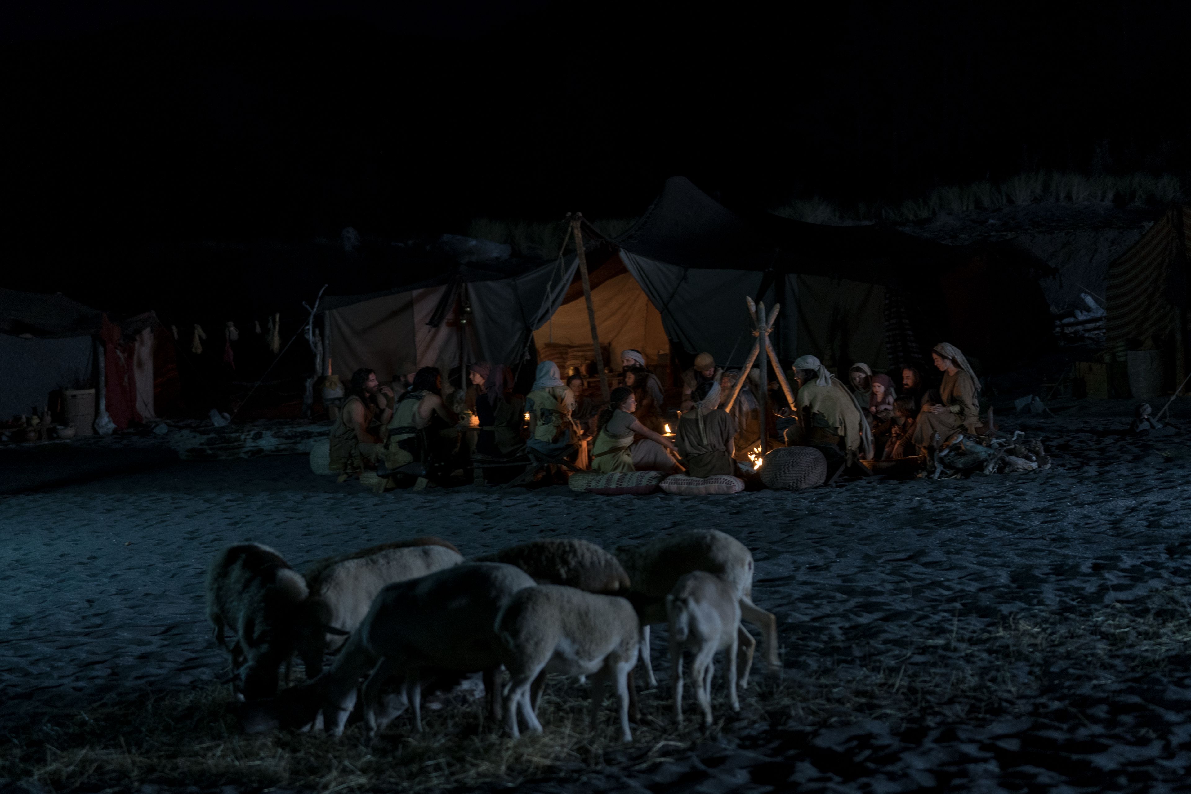 Lehi's family gathers around a campfire in the land of Bountiful.
