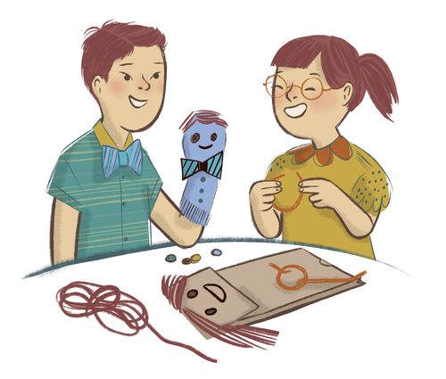 Children making puppets