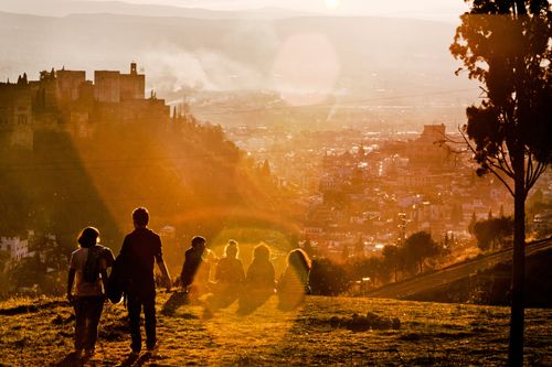 People sitting together in the sunshine