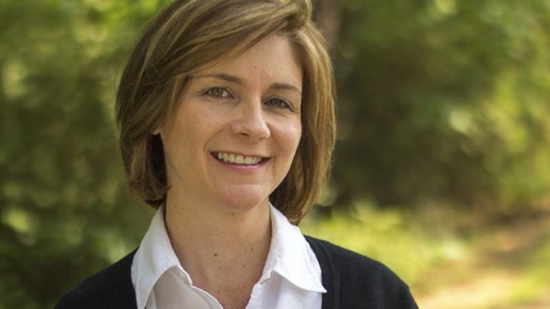A man ponders in a church pew