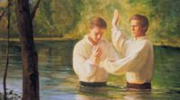 Joseph Smith, Jr. baptizing Oliver Cowdery in the Susquehanna River. Joseph is portrayed with his right hand raised and his left hand grasping the wrist of Oliver Cowdery. Trees and the river are in the background.