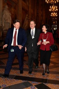 Elder Jeffrey R. Holland and Sister Patricia Holland arrive at the Houses of Parliament with Member of Parliament Stephen Kerr, in London on November 21, 2018.