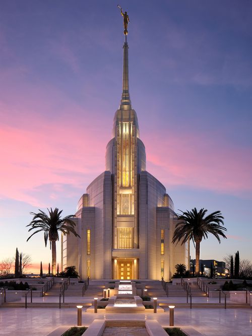 Exterior view of the Rome Italy Temple at dusk.