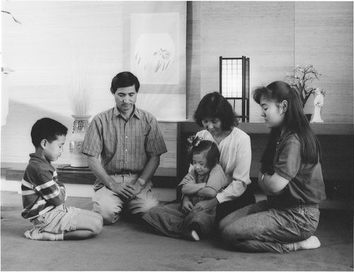 family praying