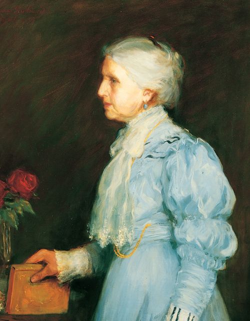 A painted portrait by Lee Greene Richards of Emmeline B. Woodward Wells against a dark brown background, wearing a blue dress and white scarf, with a rose in the background.