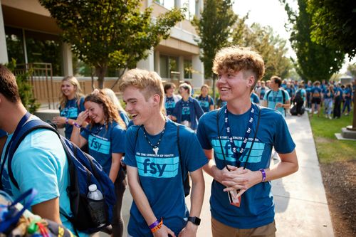 Youth walk together on BYU campus while participating in FSY.